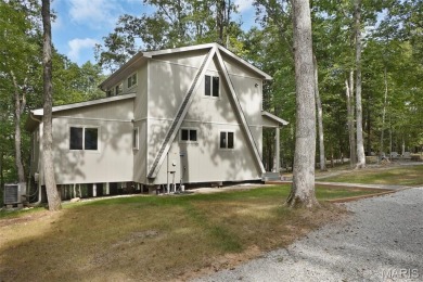 Completed in March 2025, this nearly brand-new chalet features on Innsbrook Resort Golf Course in Missouri - for sale on GolfHomes.com, golf home, golf lot