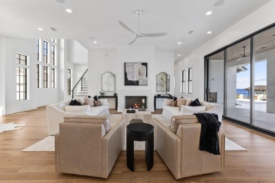 480 Captains Circle is an extraordinary waterfront estate within on Regatta Bay Golf and Country Club in Florida - for sale on GolfHomes.com, golf home, golf lot