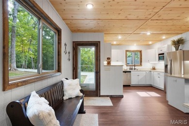 Completed in March 2025, this nearly brand-new chalet features on Innsbrook Resort Golf Course in Missouri - for sale on GolfHomes.com, golf home, golf lot