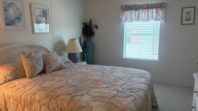 Welcome to this beautifully updated 2-bedroom, 2-bathroom home on Sabal Springs Golf and Racquet Club in Florida - for sale on GolfHomes.com, golf home, golf lot