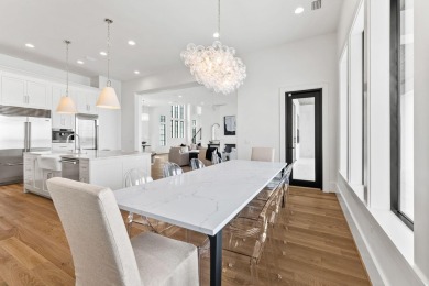 480 Captains Circle is an extraordinary waterfront estate within on Regatta Bay Golf and Country Club in Florida - for sale on GolfHomes.com, golf home, golf lot