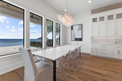 480 Captains Circle is an extraordinary waterfront estate within on Regatta Bay Golf and Country Club in Florida - for sale on GolfHomes.com, golf home, golf lot