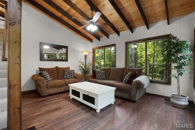 Completed in March 2025, this nearly brand-new chalet features on Innsbrook Resort Golf Course in Missouri - for sale on GolfHomes.com, golf home, golf lot