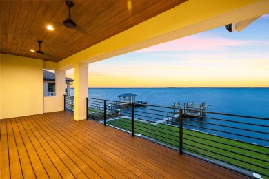 480 Captains Circle is an extraordinary waterfront estate within on Regatta Bay Golf and Country Club in Florida - for sale on GolfHomes.com, golf home, golf lot