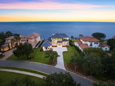 480 Captains Circle is an extraordinary waterfront estate within on Regatta Bay Golf and Country Club in Florida - for sale on GolfHomes.com, golf home, golf lot