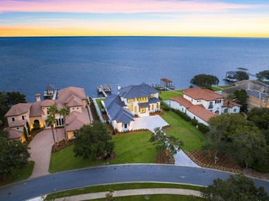 480 Captains Circle is an extraordinary waterfront estate within on Regatta Bay Golf and Country Club in Florida - for sale on GolfHomes.com, golf home, golf lot