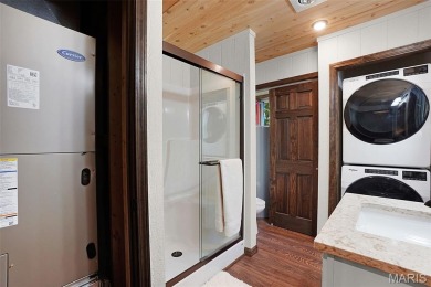 Completed in March 2025, this nearly brand-new chalet features on Innsbrook Resort Golf Course in Missouri - for sale on GolfHomes.com, golf home, golf lot