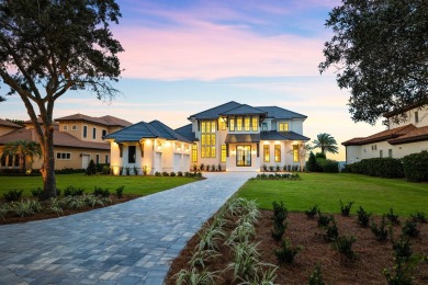 480 Captains Circle is an extraordinary waterfront estate within on Regatta Bay Golf and Country Club in Florida - for sale on GolfHomes.com, golf home, golf lot