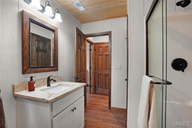 Completed in March 2025, this nearly brand-new chalet features on Innsbrook Resort Golf Course in Missouri - for sale on GolfHomes.com, golf home, golf lot