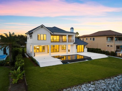 480 Captains Circle is an extraordinary waterfront estate within on Regatta Bay Golf and Country Club in Florida - for sale on GolfHomes.com, golf home, golf lot