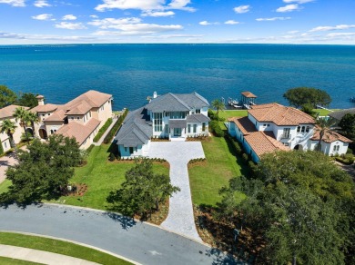 480 Captains Circle is an extraordinary waterfront estate within on Regatta Bay Golf and Country Club in Florida - for sale on GolfHomes.com, golf home, golf lot