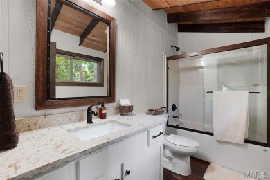 Completed in March 2025, this nearly brand-new chalet features on Innsbrook Resort Golf Course in Missouri - for sale on GolfHomes.com, golf home, golf lot