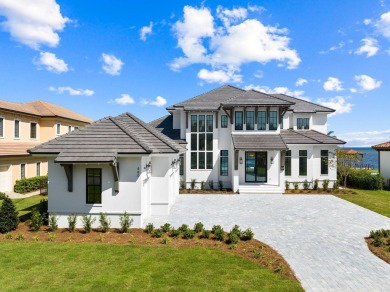 480 Captains Circle is an extraordinary waterfront estate within on Regatta Bay Golf and Country Club in Florida - for sale on GolfHomes.com, golf home, golf lot