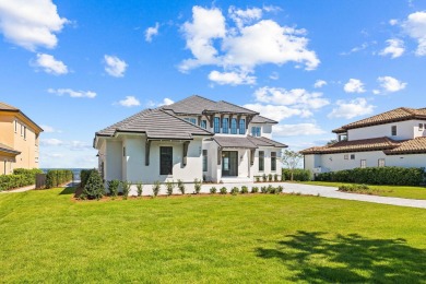 480 Captains Circle is an extraordinary waterfront estate within on Regatta Bay Golf and Country Club in Florida - for sale on GolfHomes.com, golf home, golf lot