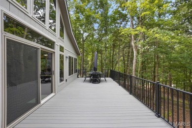 Completed in March 2025, this nearly brand-new chalet features on Innsbrook Resort Golf Course in Missouri - for sale on GolfHomes.com, golf home, golf lot