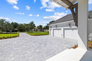 480 Captains Circle is an extraordinary waterfront estate within on Regatta Bay Golf and Country Club in Florida - for sale on GolfHomes.com, golf home, golf lot
