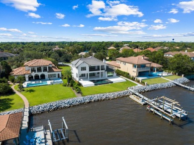 480 Captains Circle is an extraordinary waterfront estate within on Regatta Bay Golf and Country Club in Florida - for sale on GolfHomes.com, golf home, golf lot