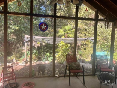 Welcome to 201 Bradbury Circle South, a tucked-away retreat in on Lake Forest Yacht and Country Club in Alabama - for sale on GolfHomes.com, golf home, golf lot