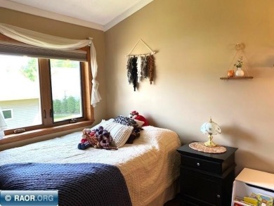Discover this inviting 3-bedroom, 1.75-bathroom home on Virginia Golf Course in Minnesota - for sale on GolfHomes.com, golf home, golf lot
