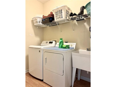 Welcome to this private home tucked in the River North Golf on Canongate At Healy Point Country Club in Georgia - for sale on GolfHomes.com, golf home, golf lot