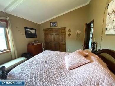 Discover this inviting 3-bedroom, 1.75-bathroom home on Virginia Golf Course in Minnesota - for sale on GolfHomes.com, golf home, golf lot