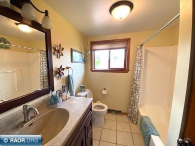 Discover this inviting 3-bedroom, 1.75-bathroom home on Virginia Golf Course in Minnesota - for sale on GolfHomes.com, golf home, golf lot