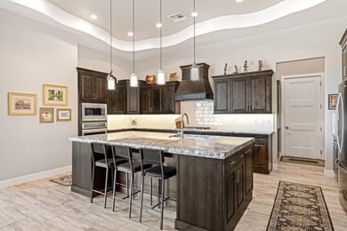 This stunning home is situated perfectly on the golf course on The Ledges Golf Club in Utah - for sale on GolfHomes.com, golf home, golf lot