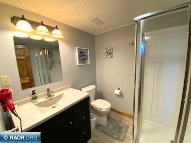 Discover this inviting 3-bedroom, 1.75-bathroom home on Virginia Golf Course in Minnesota - for sale on GolfHomes.com, golf home, golf lot