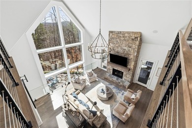 Nestled along the pristine shoreline of Lake Keowee, this on The Reserve At Lake Keowee in South Carolina - for sale on GolfHomes.com, golf home, golf lot