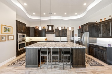 This stunning home is situated perfectly on the golf course on The Ledges Golf Club in Utah - for sale on GolfHomes.com, golf home, golf lot