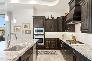 This stunning home is situated perfectly on the golf course on The Ledges Golf Club in Utah - for sale on GolfHomes.com, golf home, golf lot