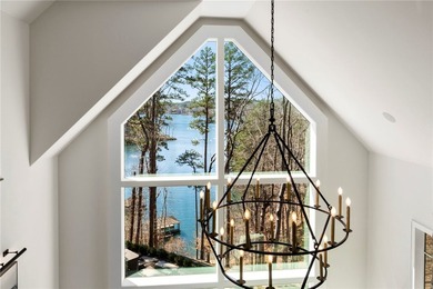 Nestled along the pristine shoreline of Lake Keowee, this on The Reserve At Lake Keowee in South Carolina - for sale on GolfHomes.com, golf home, golf lot
