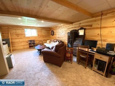 Discover this inviting 3-bedroom, 1.75-bathroom home on Virginia Golf Course in Minnesota - for sale on GolfHomes.com, golf home, golf lot