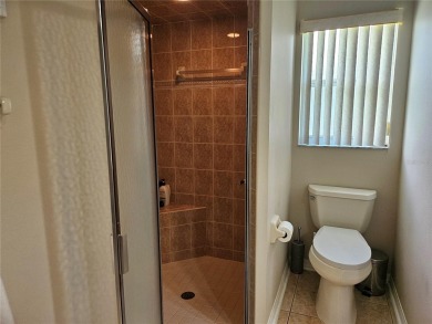 Move-ready 3 bedroom, 2 bath villa in Brentwood with 9 hole on Brentwood Farms Golf Club in Florida - for sale on GolfHomes.com, golf home, golf lot