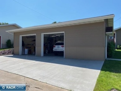 Discover this inviting 3-bedroom, 1.75-bathroom home on Virginia Golf Course in Minnesota - for sale on GolfHomes.com, golf home, golf lot