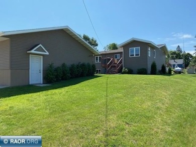 Discover this inviting 3-bedroom, 1.75-bathroom home on Virginia Golf Course in Minnesota - for sale on GolfHomes.com, golf home, golf lot