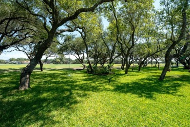 Nestled on a quiet cul-de-sac in the desirable Rockport Country on Rockport Country Club in Texas - for sale on GolfHomes.com, golf home, golf lot