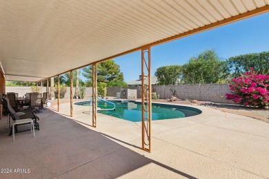 Welcome to this beautifully designed single-level home featuring on Sun City Lakes West and East in Arizona - for sale on GolfHomes.com, golf home, golf lot