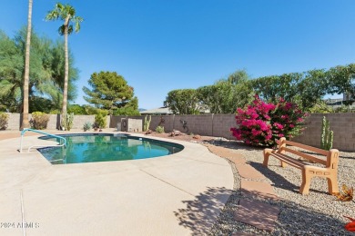 Welcome to this beautifully designed single-level home featuring on Sun City Lakes West and East in Arizona - for sale on GolfHomes.com, golf home, golf lot