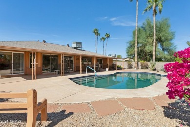 Welcome to this beautifully designed single-level home featuring on Sun City Lakes West and East in Arizona - for sale on GolfHomes.com, golf home, golf lot