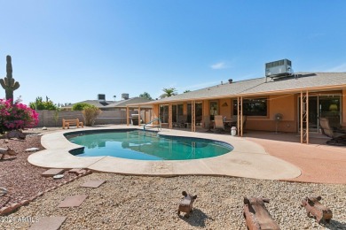 Welcome to this beautifully designed single-level home featuring on Sun City Lakes West and East in Arizona - for sale on GolfHomes.com, golf home, golf lot