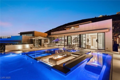 Perched in prestigious MacDonald Highlands, this luxury on Dragon Ridge Country Club in Nevada - for sale on GolfHomes.com, golf home, golf lot