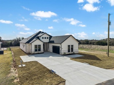Discover elegance and modern living in this newly constructed on White Bluff Resort - New Course in Texas - for sale on GolfHomes.com, golf home, golf lot