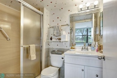 Welcome to this 1st floor, 2/2 in beautiful, quiet Palm Springs on Oriole Golf and Tennis Club in Florida - for sale on GolfHomes.com, golf home, golf lot