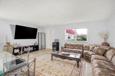 Updated, Single Story, Corner Villa In Desirable Seville Section on Kings Point Golf -Flanders Way in Florida - for sale on GolfHomes.com, golf home, golf lot