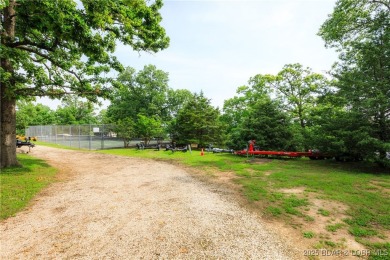 Experience lakefront living at its finest in this beautifully on Sycamore Creek Golf Club in Missouri - for sale on GolfHomes.com, golf home, golf lot