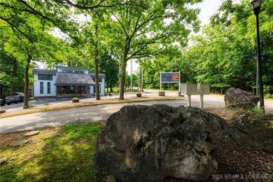 Experience lakefront living at its finest in this beautifully on Sycamore Creek Golf Club in Missouri - for sale on GolfHomes.com, golf home, golf lot