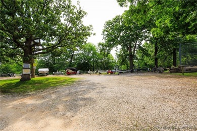 Experience lakefront living at its finest in this beautifully on Sycamore Creek Golf Club in Missouri - for sale on GolfHomes.com, golf home, golf lot