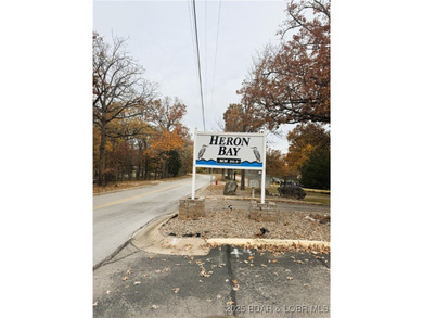 Experience lakefront living at its finest in this beautifully on Sycamore Creek Golf Club in Missouri - for sale on GolfHomes.com, golf home, golf lot