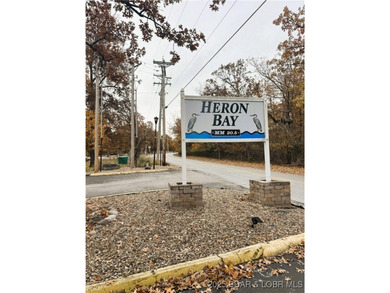 Experience lakefront living at its finest in this beautifully on Sycamore Creek Golf Club in Missouri - for sale on GolfHomes.com, golf home, golf lot